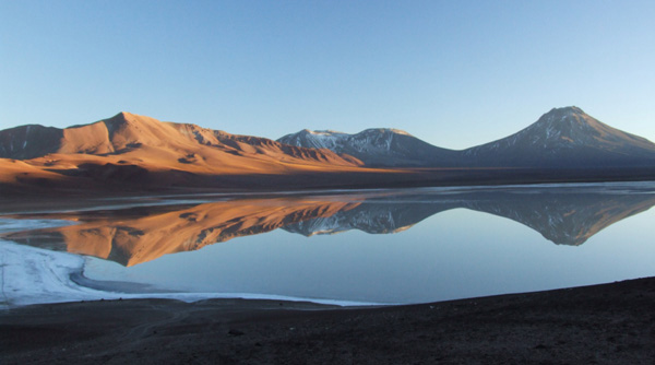 Sunrise over Laguna Lejia and Volcan Lascar, Chile.