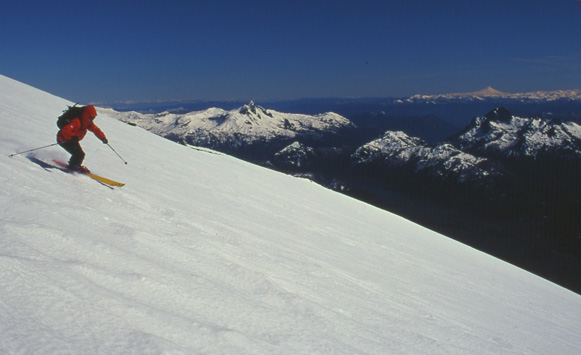 Skiing down from the RIM hut on near perfect spring snow, Volcan Lanin.