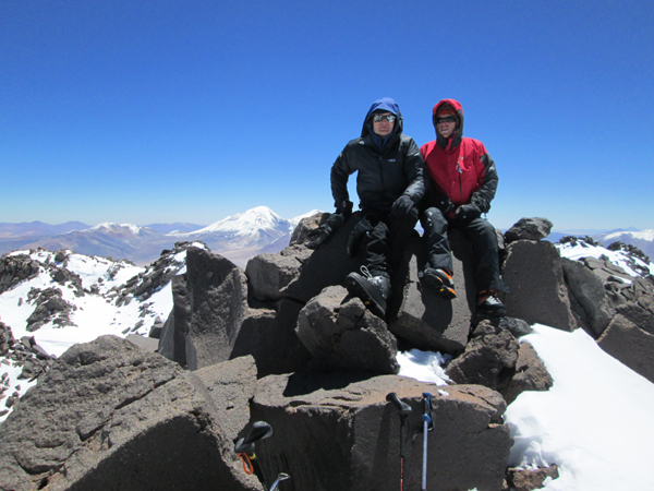 On the summit pinnacle of Cazadero, February 2013. Tres Cruces Sur is the peak in the background.