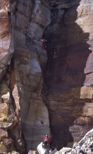 Colombian climber Leo on the crux of the first pitch